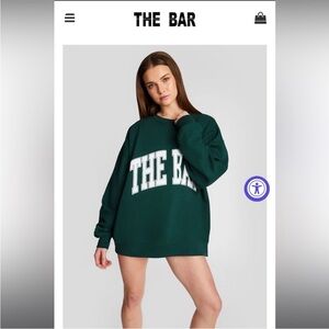 The bar varsity sweatshirt. Green size large